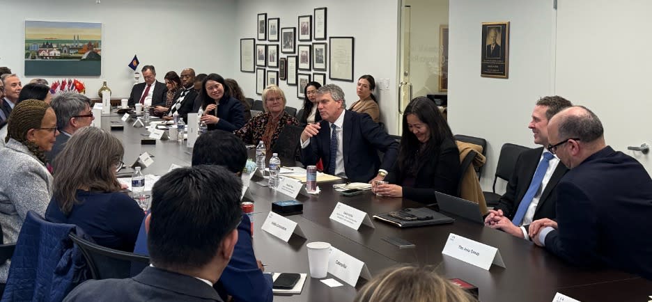 Assistant Secretary Fogel (Center) Speaking with USABC and Members